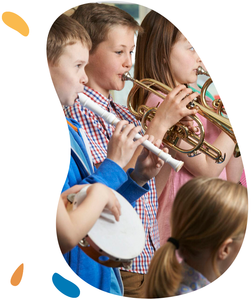Group Of Students Playing In School Orchestra Together